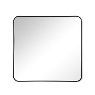 A square mirror with black curved edges and glass in the middle of it