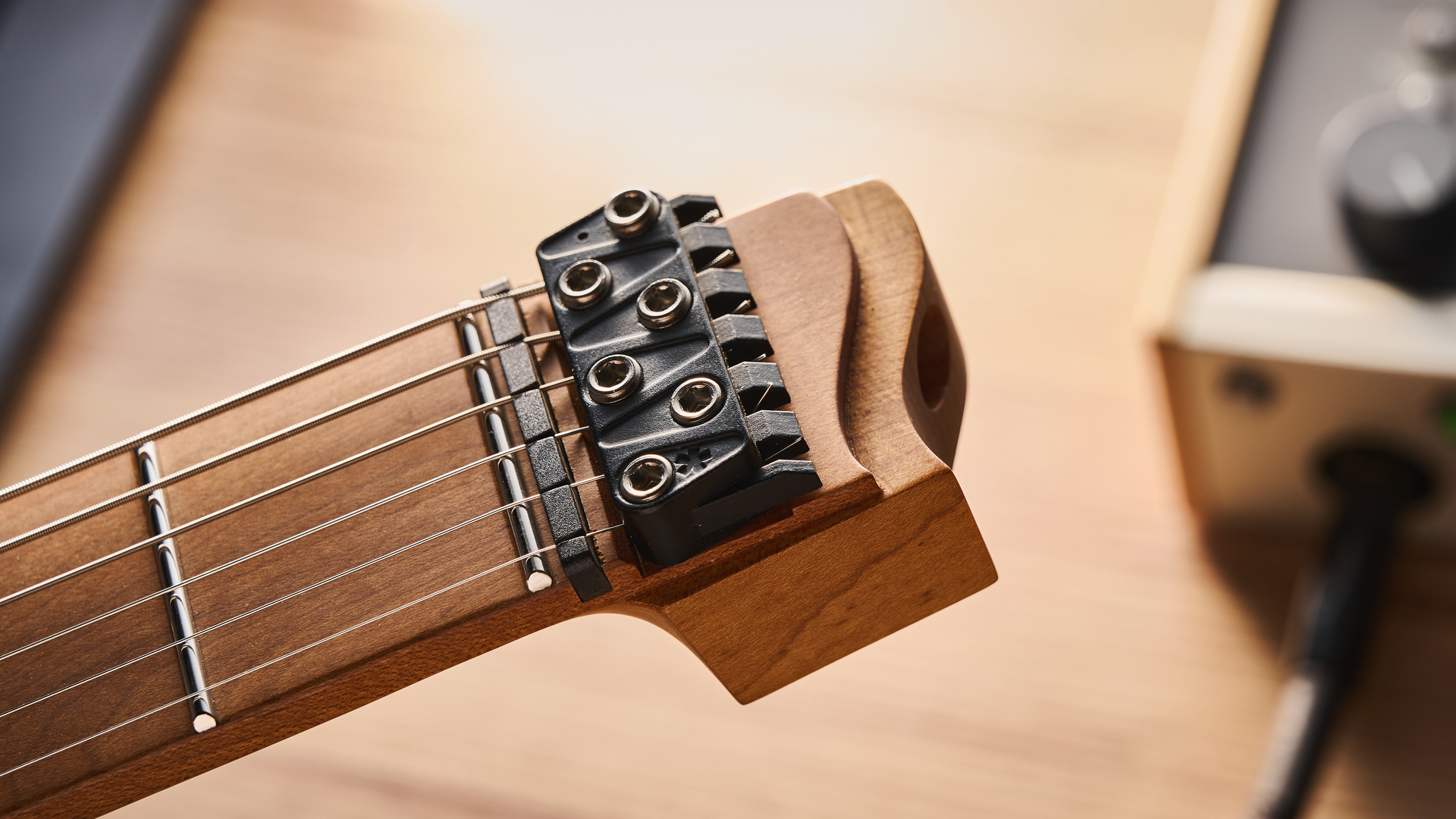 Strandberg N2 Boden Standard in Transformative Teal, shot in close-up and against a pale wooden floor.