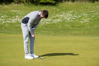 Golfer putts the ball with a TaylorMade RBZ Soft 2022