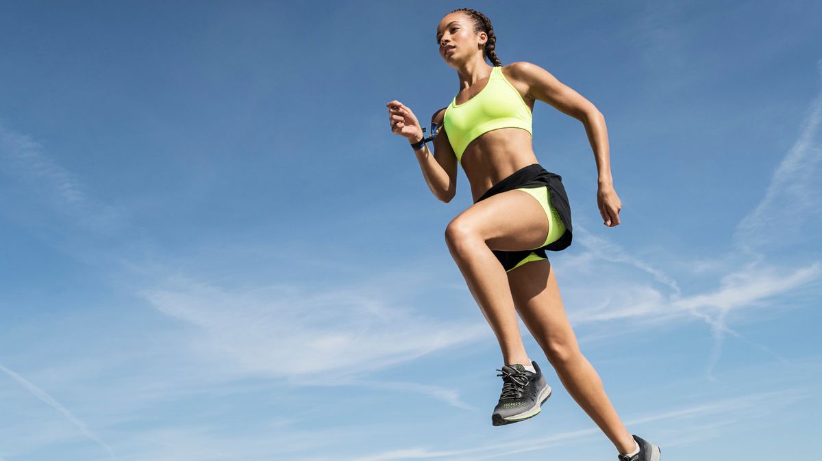 A woman running in a pair of shorts