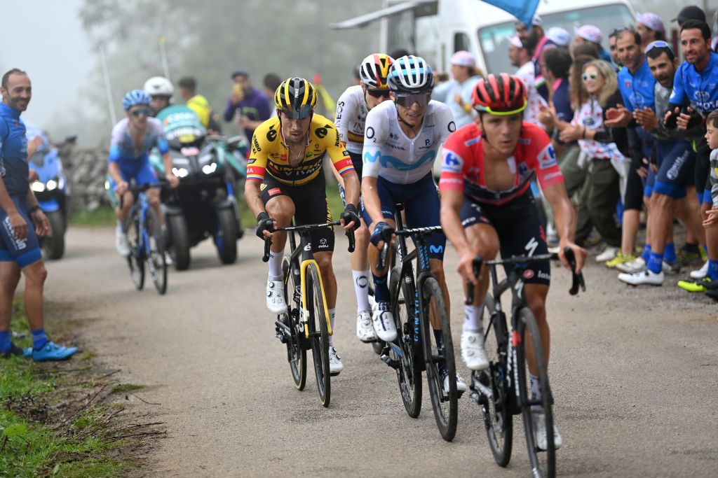 COLLU FANCUAYA SPAIN AUGUST 27 Remco Evenepoel of Belgium and Team QuickStep Alpha Vinyl Red Leader Jersey Enric Mas Nicolau of Spain and Movistar Team Primoz Roglic of Slovenia and Team Jumbo Visma and Carlos Rodriguez Cano of Spain and Team INEOS Grenadiers compete in the chase group while fans cheer during the 77th Tour of Spain 2022 Stage 8 a 1534km stage from Pola de Laviana to Collu Fancuaya 1084m LaVuelta22 WorldTour on August 27 2022 in Collu Fancuaya Spain Photo by Justin SetterfieldGetty Images