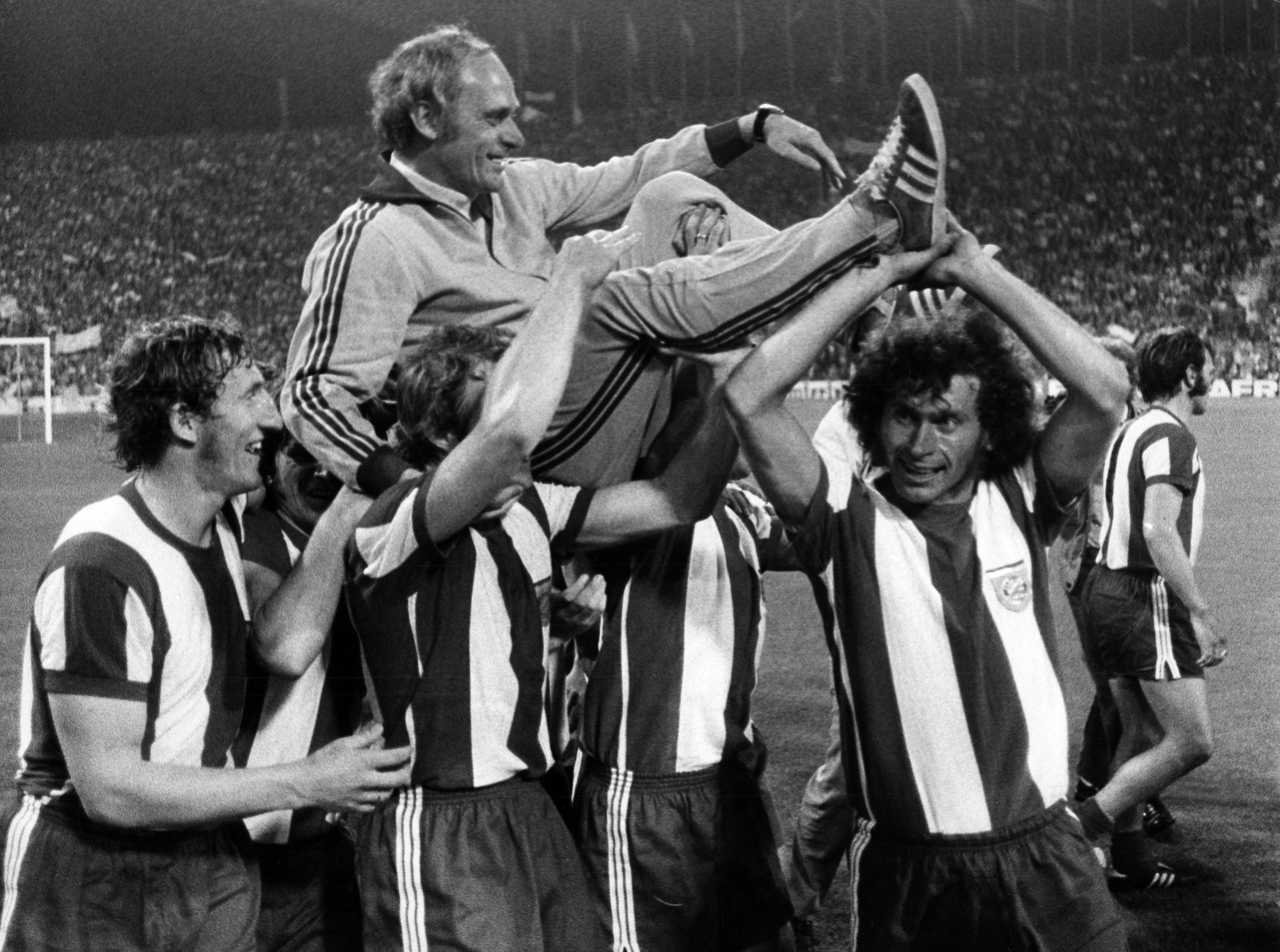 Udo Lattek is thrown into the air by his players after Bayern Munich's Bundesliga title success in 1972.