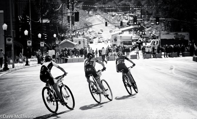 Spenser Paxon (Kona) on the front of the race with four laps to go