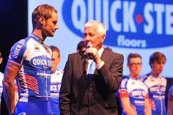 Patrick Lefevere speaks with Tom Boonen on stage.