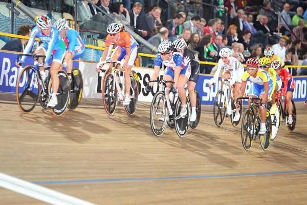 Riders look at each other as another sprint approaches