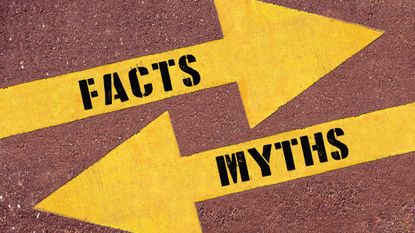 FACTS or MYTHS , words on Two arrows. Two Yellow Arrows Painted on Asphalt showing different directions