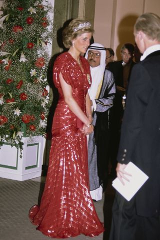 Diana, as former Princess of Wales, wore red frequently too