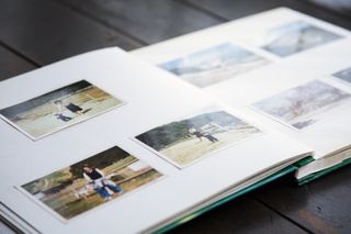 A photo book with photos inside.