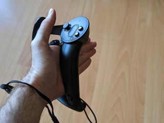 The Index controllers strap to your hand, so you can let go of the grip entirely without them falling to the ground.
