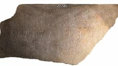 A slab of granite etched with hieroglyphics
