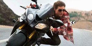 Tom Cruise riding a motorcycle