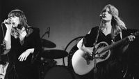 Sibling American musicians Ann (left) and Nancy Wilson of the rock group Heart perform onstage at the Universal Amphitheatre, Los Angeles, California, July 15, 1977