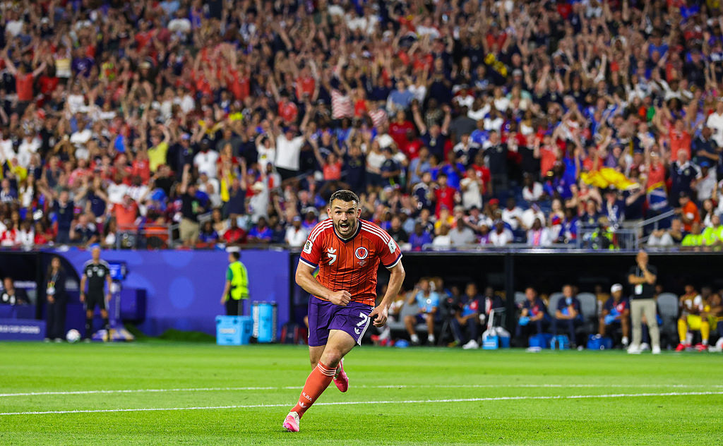 John McGinn's deflected strike put Scotland 1-0 up