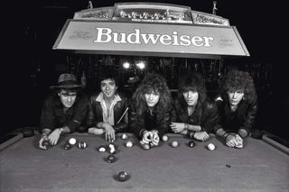 Bon Jovi in 1985, leaning on a pool table