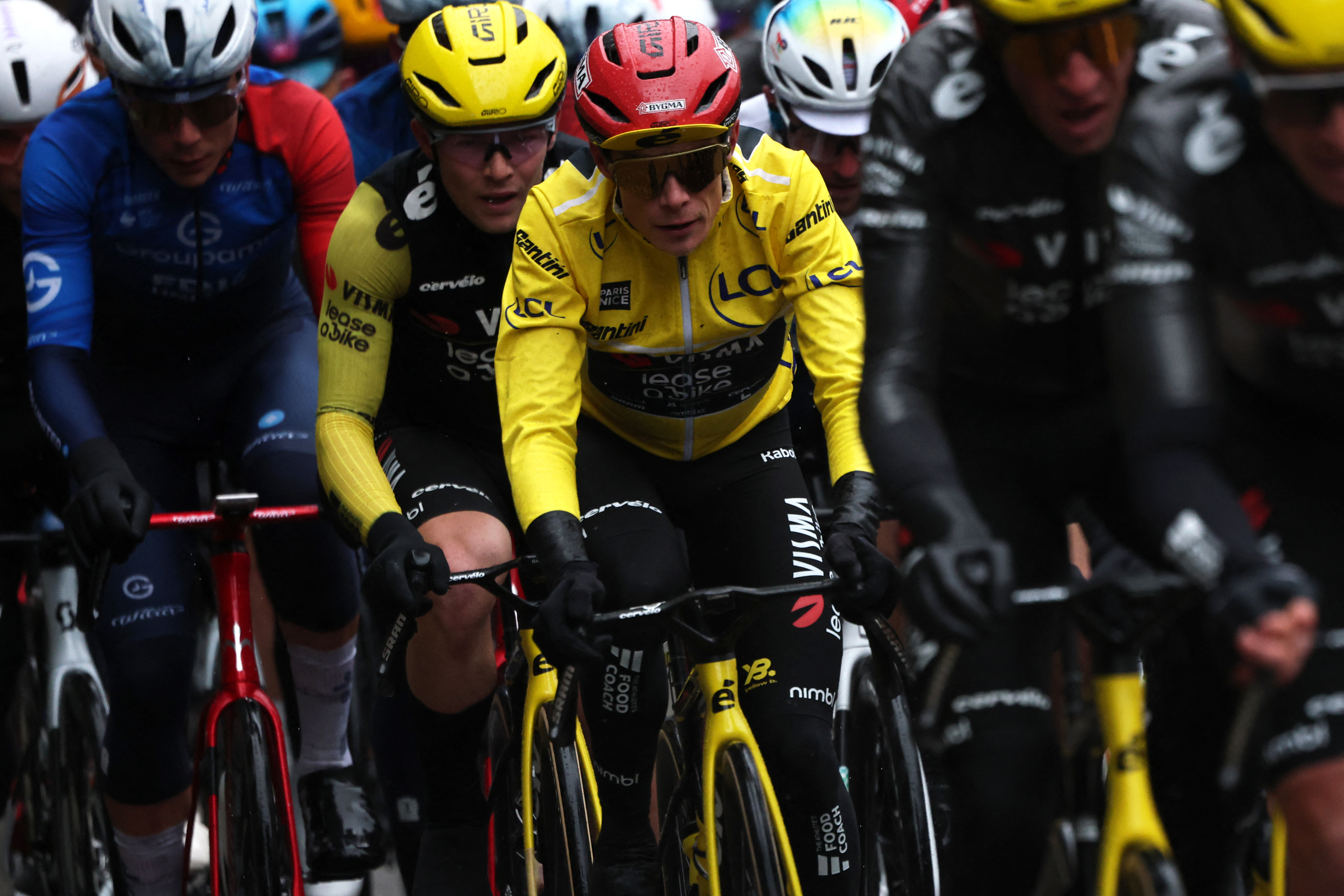 Team Visma - Lease a Bike's Danish rider Jonas Vingegaard, wearing the overall leader yellow jersey, rides with the pack during the 7th stage of the Paris-Nice cycling race, 47 km between Le Broc and Isola-Village, on March 14, 2026. Due to deteriorating weather conditions, the route of stage 7 has been changed to a 47 km race from Le Broc to Isola. (Photo by Anne-Christine POUJOULAT / AFP via Getty Images)
