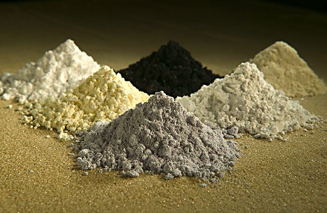 These rare-earth oxides are used as tracers to determine which parts of a watershed are eroding. Clockwise from top center: praseodymium, cerium, lanthanum, neodymium, samarium, and gadolinium.