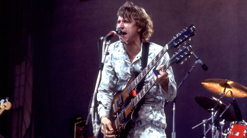 American Rock musician Joe Walsh plays guitar as he performs onstage at the US Festival, Ontario, California, May 30, 1983. 