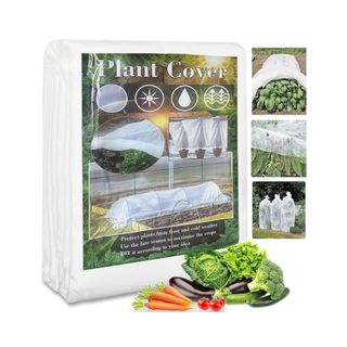 Clear square packet holding a white folded up plant fleece with pictures of vegetables on a white background