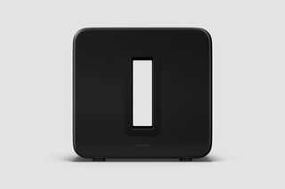 A black Sonos Sub on a white background