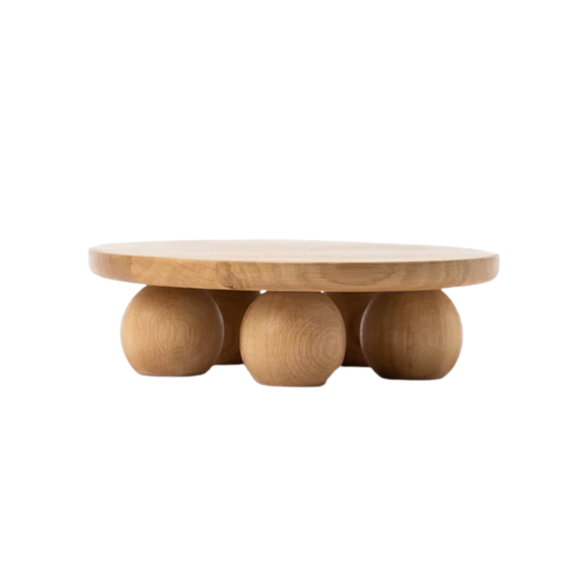 a wooden cake stand with spherical legs