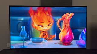 Samsung S95F with Ember from Elemental on screen 