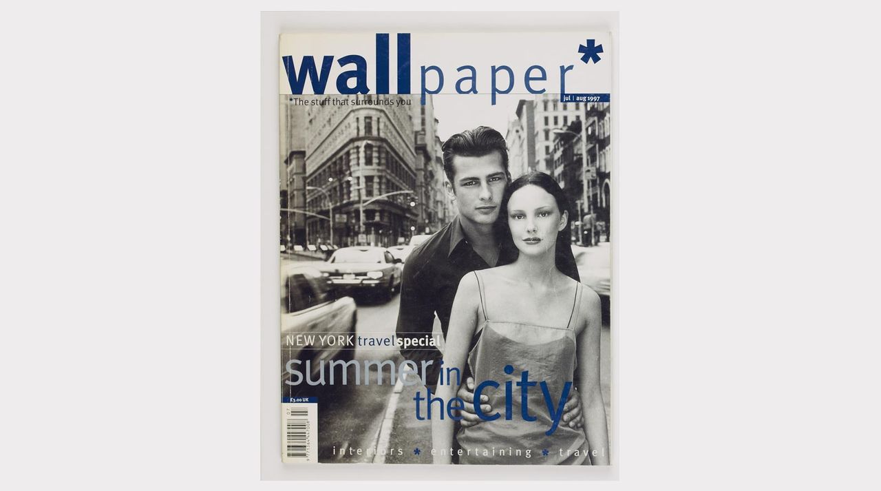 Black and white cover of wallpaper magazine showing a man and woman on streets of new york