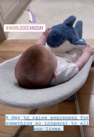 Princess Eugenie & Jack Brooksbank's Son August Holding Dolphin Soft Toy