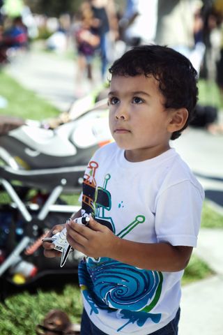 Child with Toy Space Shuttle at Griffith Observatory.