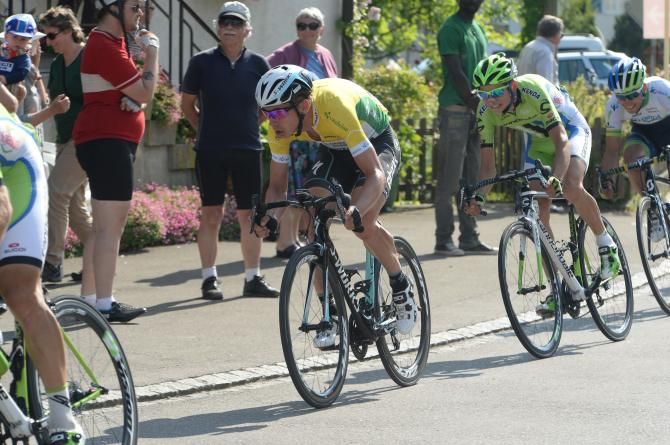Tony Martin keeps to the back of his team