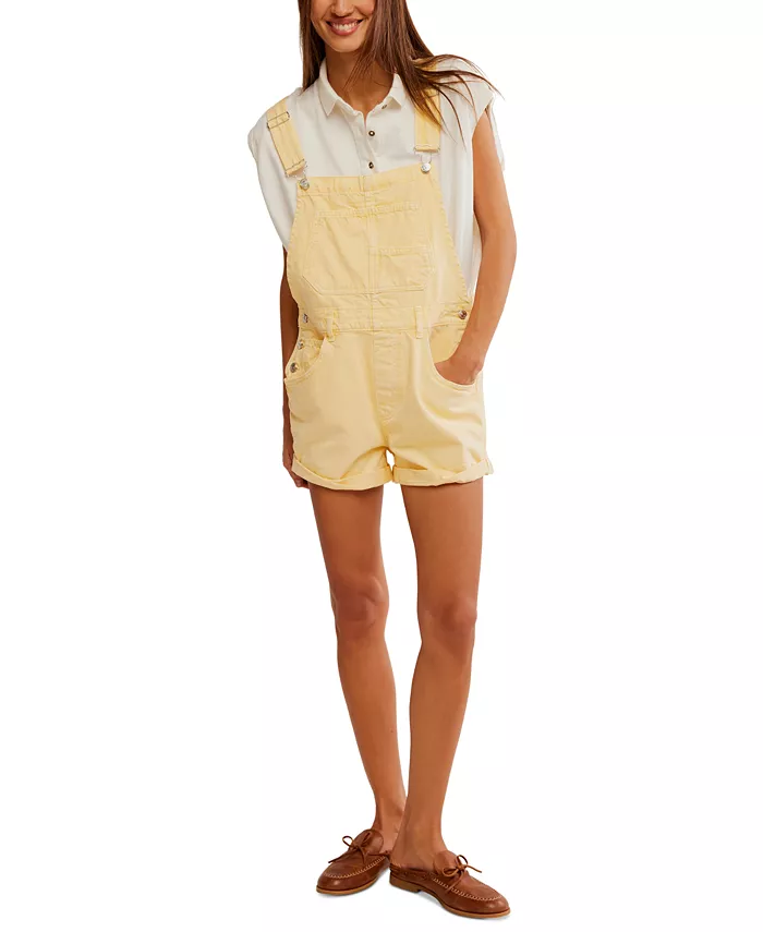 A model wearing yellow shortalls