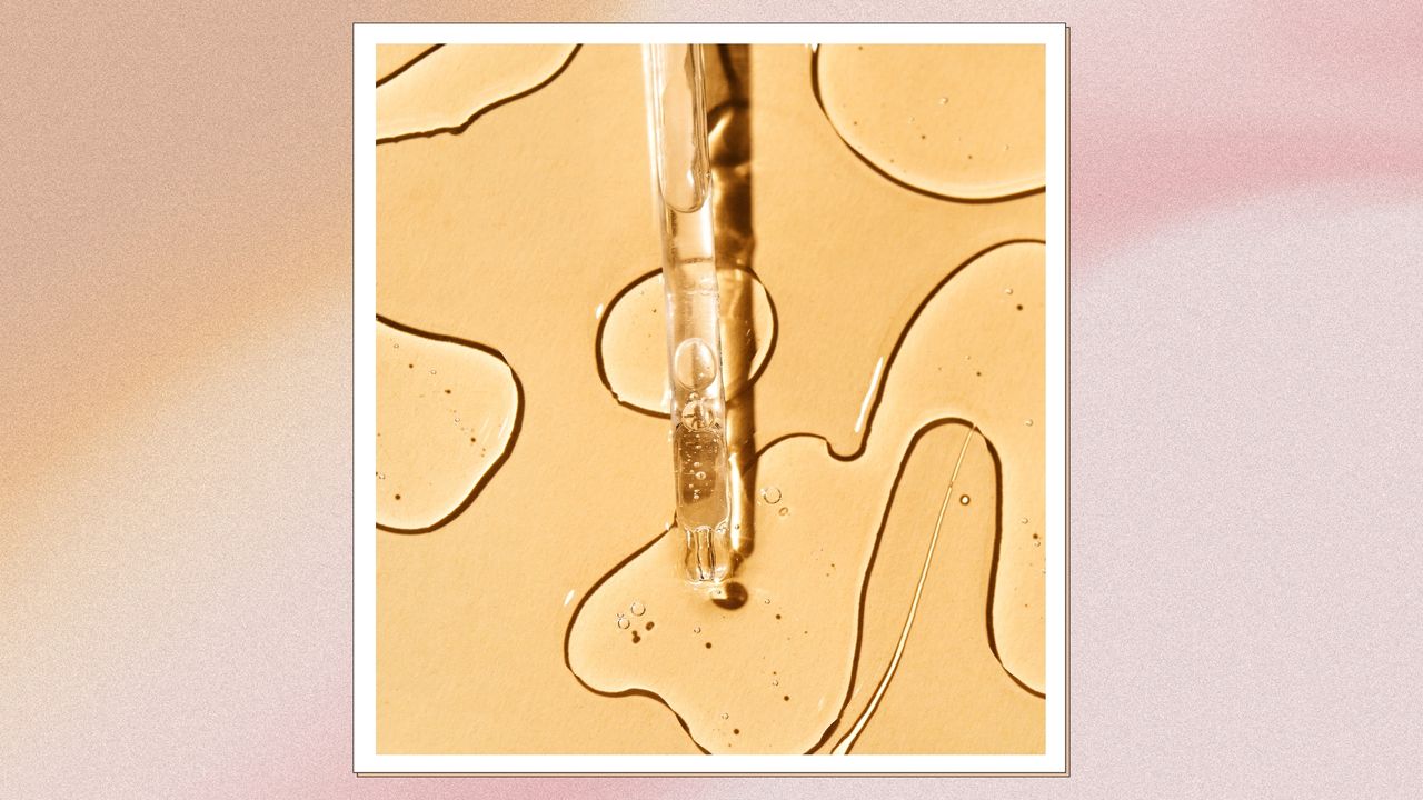 A close up of a glass serum pipette surrounded by swirls of a serum-like liquid on a orange background/ in an orange and pink gradient template