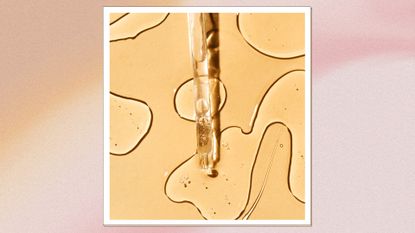 A close up of a glass serum pipette surrounded by swirls of a serum-like liquid on a orange background/ in an orange and pink gradient template