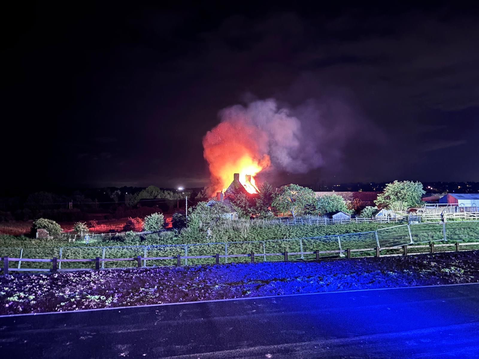 A building on the Althorp estate burning down