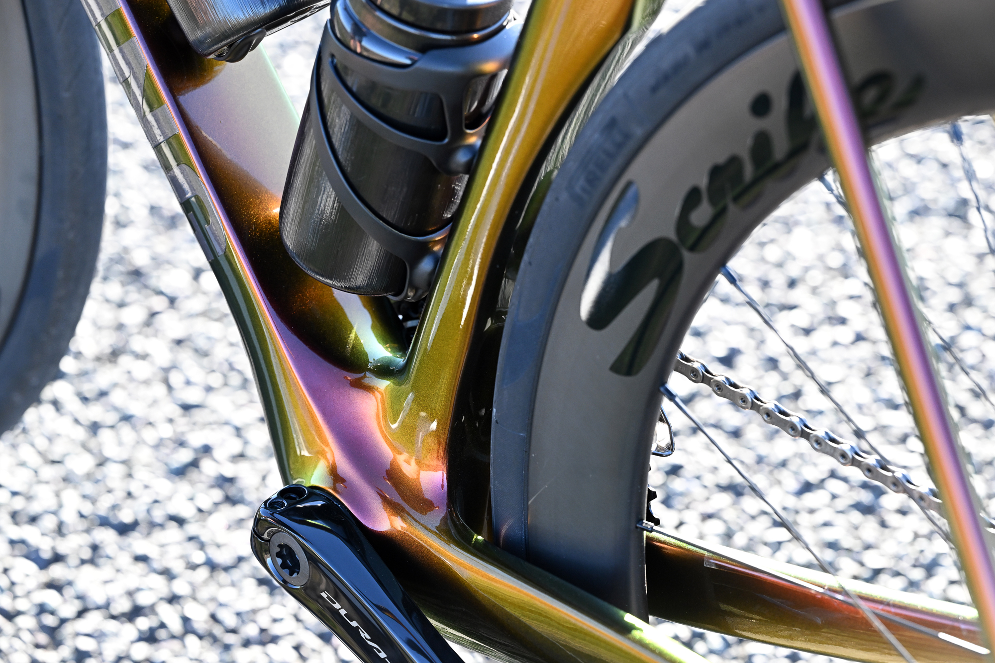 close up of the bottom bracket area of a Handsling bike showing a multitude of colours