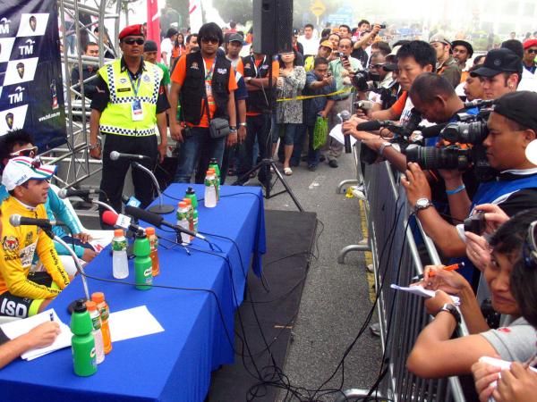 Riders face questions during the after-race press conference