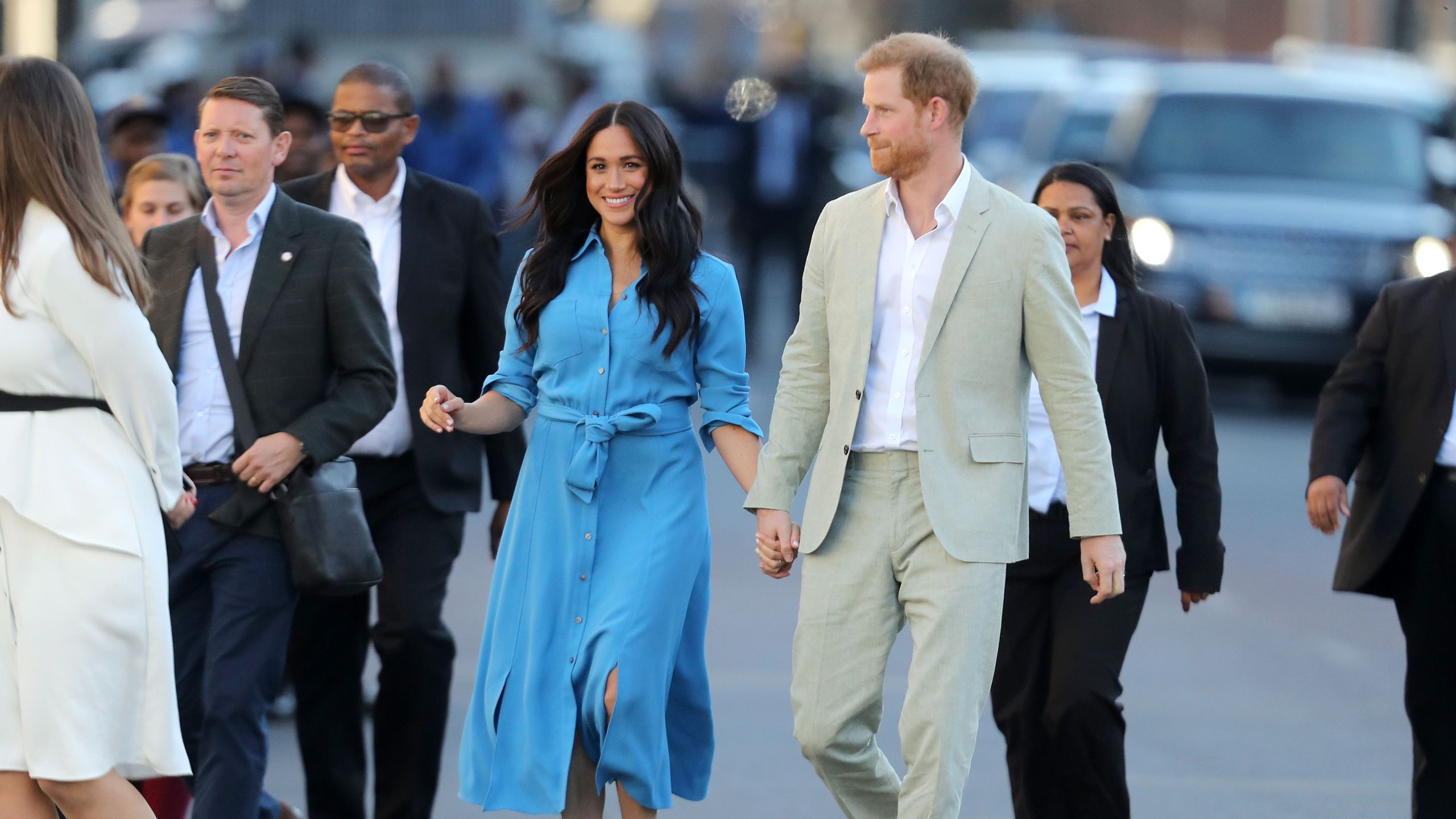meghan blue shirt dress The Duchess of Sussex looks so on-trend in blue shirt dress