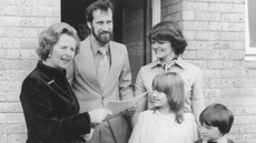 Margaret Thatcher photographed in 1979 handing over the deeds to a council house to the King family in Milton Keynes