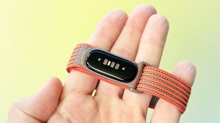Close-up of the sensors on the Fitbit Air fitness tracker on the special edition Stephen Curry strap