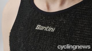 A close up view of the Santini logo and furry material on the Santini Alpha Base Layer