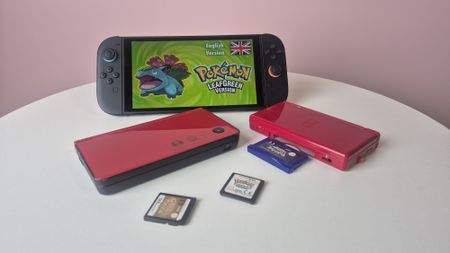 Various Pok&eacute;mon games with Switch 2, Nintendo DSi XL and Nintendo DS Lite on table
