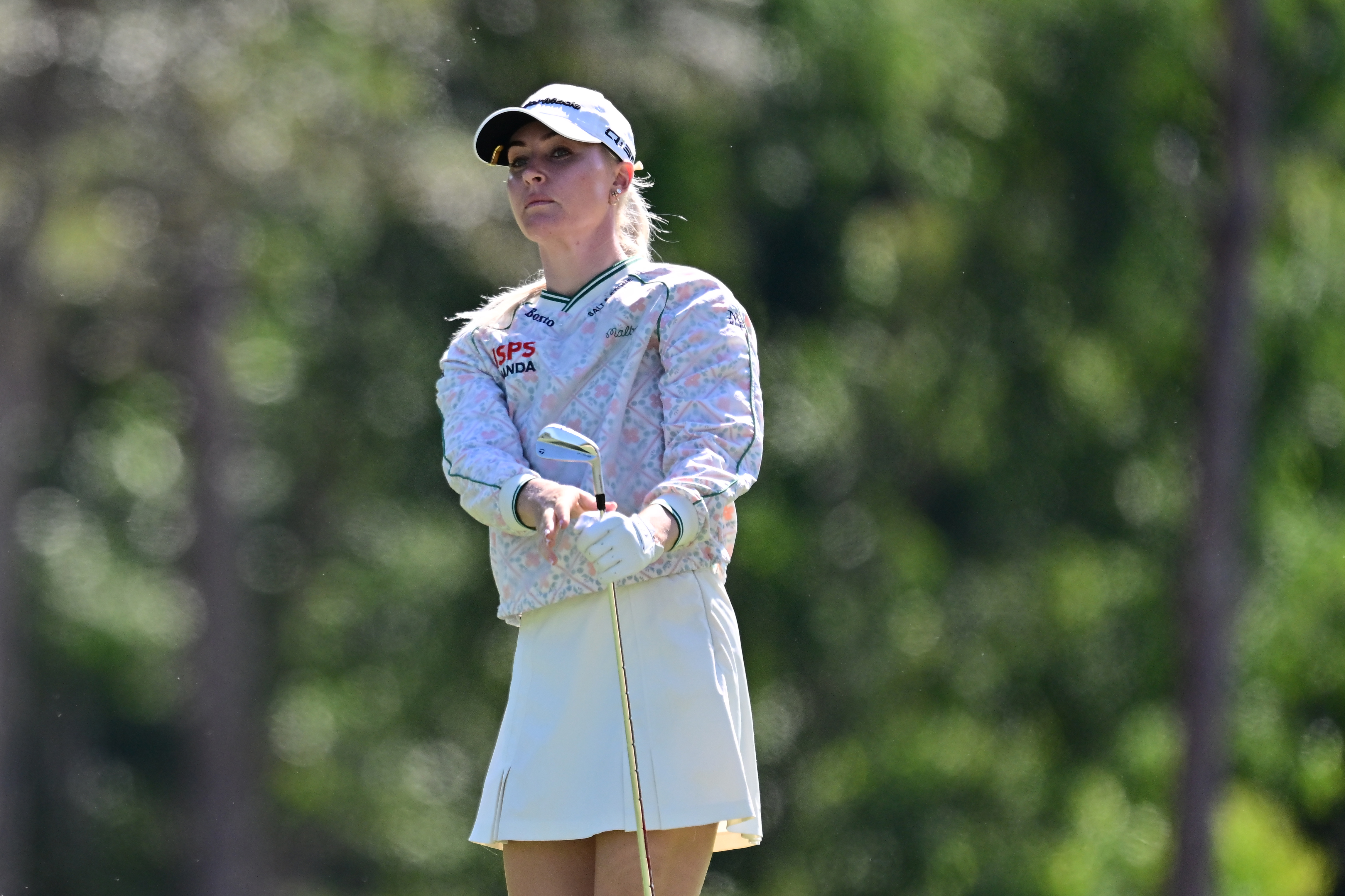 Charley Hull hits an iron shot