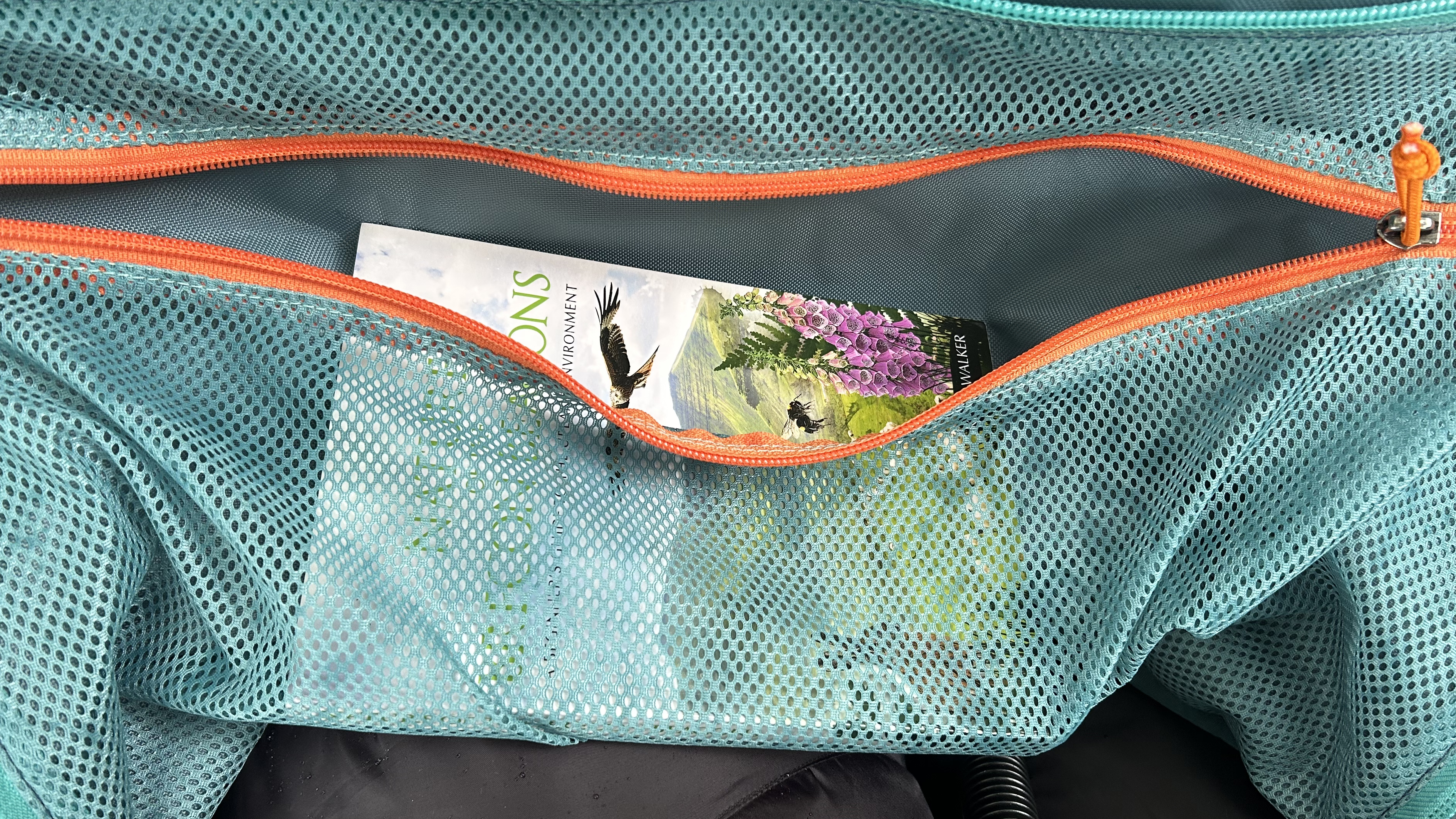 Book in zippered pocket