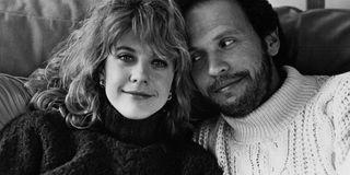 a black and white photo of meg ryan and billy crystal in sweaters for when harry met sally