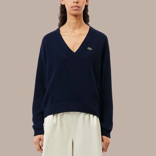 flat lay image of lacoste jumper