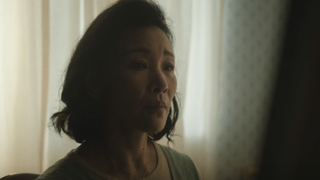 Joan Chen looking sad in Didi