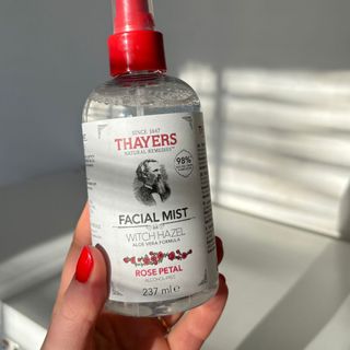 Laura holding Thayers Facial Mist Rose Petal