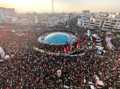 Mourners gather in Tehran.