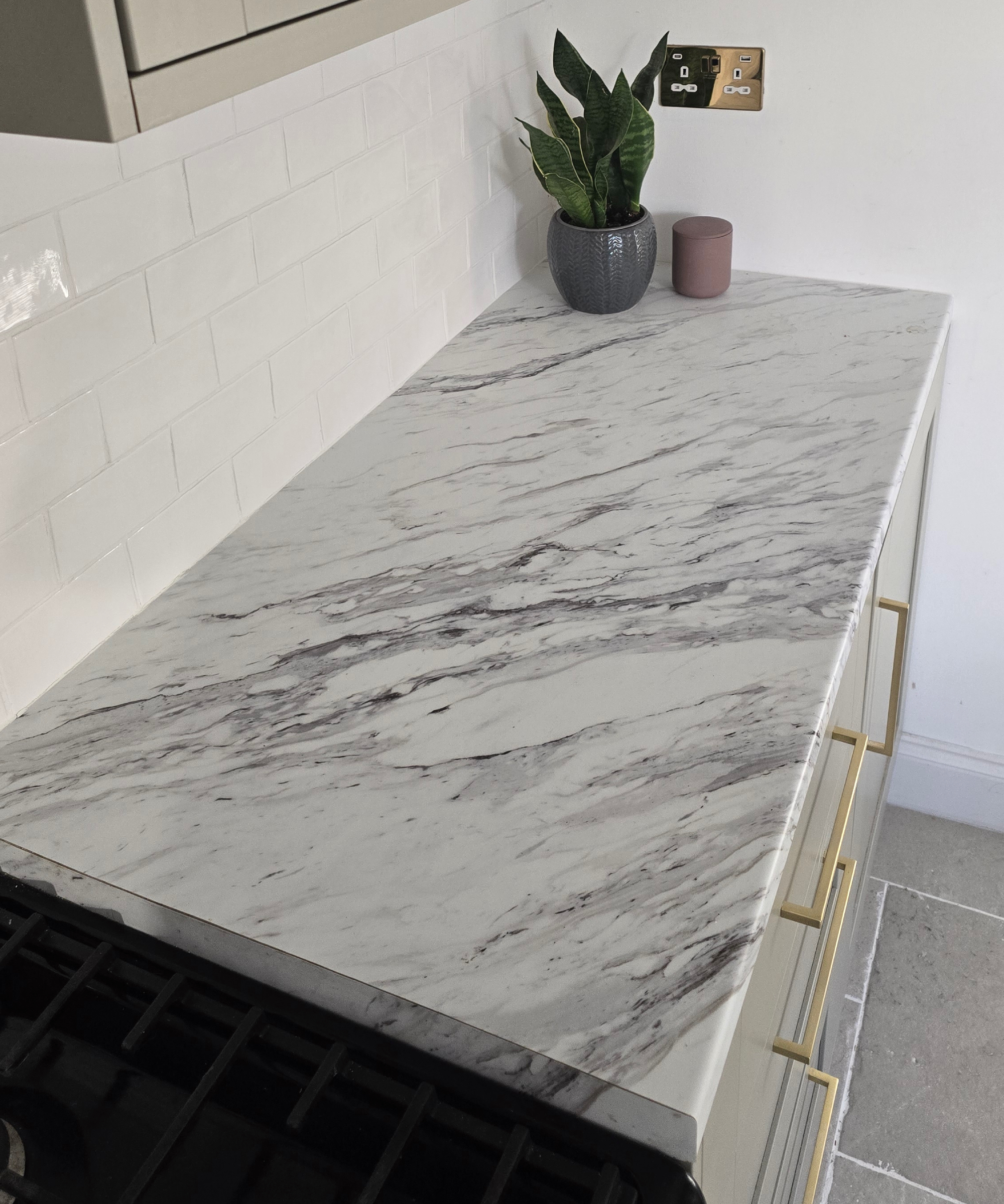 Wickes Ohio kitchen in green with marble look worktop