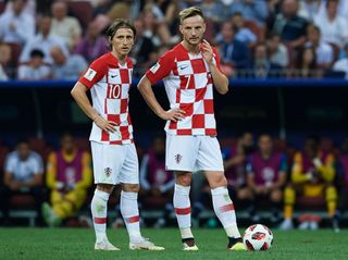 Ivan Rakitic and Luka Modric of Croatia during the 2018 FIFA World Cup Russia Final between France and Croatia at Luzhniki Stadium on July 15, 2018 in Moscow, Russia. (Photo by Quality Sport Images/Getty Images) Lionel Messi