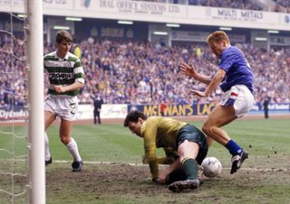Mo Johnston in action for Rangers against Celtic in 1990.